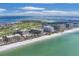 Aerial showing beachfront location and resort amenities at 545 Sanctuary Dr # A803, Longboat Key, FL 34228