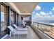 Spacious balcony with ocean and golf course views at 545 Sanctuary Dr # A803, Longboat Key, FL 34228