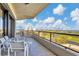 Spacious balcony offering stunning golf and water views at 545 Sanctuary Dr # A803, Longboat Key, FL 34228