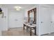 Bright entryway with a console table and large mirror at 545 Sanctuary Dr # A803, Longboat Key, FL 34228