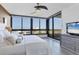 Spacious main bedroom with water views, a comfortable bed, and built-in dresser at 545 Sanctuary Dr # A803, Longboat Key, FL 34228