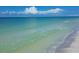 Scenic ocean view with gentle waves lapping the shore at 545 Sanctuary Dr # A803, Longboat Key, FL 34228