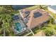 House with solar panels and screened pool at 5554 New Covington Dr, Sarasota, FL 34233