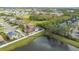 House and surrounding neighborhood view at 5554 New Covington Dr, Sarasota, FL 34233