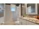 Bathroom with tub, shower, granite vanity, and window at 5554 New Covington Dr, Sarasota, FL 34233