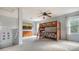 Upstairs bedroom with a bunk bed and plenty of natural light at 5554 New Covington Dr, Sarasota, FL 34233