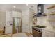 Stainless steel appliances and white shaker cabinets in this kitchen at 5554 New Covington Dr, Sarasota, FL 34233