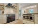 Blue Viking range and built-in microwave in a stylish kitchen at 5554 New Covington Dr, Sarasota, FL 34233