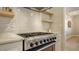 Modern kitchen features stainless steel appliances and white shaker cabinets at 5554 New Covington Dr, Sarasota, FL 34233