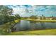 Serene lake view in a residential neighborhood at 5554 New Covington Dr, Sarasota, FL 34233