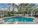 Relaxing pool and spa with screened enclosure at 5554 New Covington Dr, Sarasota, FL 34233