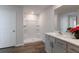 Bathroom with shower and single vanity at 5846 Silver Moonlight Dr, Palmetto, FL 34221
