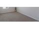 Empty bedroom with neutral walls and carpeting at 5846 Silver Moonlight Dr, Palmetto, FL 34221