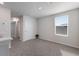 Spacious bedroom with grey carpet and large window at 5846 Silver Moonlight Dr, Palmetto, FL 34221