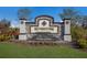 Stone community entrance sign with a water feature at 5846 Silver Moonlight Dr, Palmetto, FL 34221