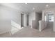 Upstairs hallway with carpet and multiple doors at 5846 Silver Moonlight Dr, Palmetto, FL 34221
