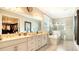Spa-like bathroom with double vanity, soaking tub, and walk-in shower at 6337 Rivo Lakes Blvd, Sarasota, FL 34241
