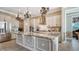Large kitchen with island, stainless steel appliances, and granite countertops at 6337 Rivo Lakes Blvd, Sarasota, FL 34241