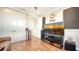 Home theater with large screen TV, sound system and comfortable seating at 6337 Rivo Lakes Blvd, Sarasota, FL 34241