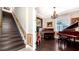 Dark hardwood staircase with decorative wall trim at 6337 Rivo Lakes Blvd, Sarasota, FL 34241