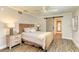 Serene bedroom with a stylish bed and wood floors at 6706 22Nd W Ave, Bradenton, FL 34209