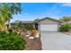 Charming single-story home with landscaped yard and attached garage at 6706 22Nd W Ave, Bradenton, FL 34209