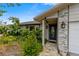 Attractive front entry with stone accents and a dark blue door at 6706 22Nd W Ave, Bradenton, FL 34209