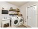 Bright laundry room, featuring washer, dryer and extra storage at 6706 22Nd W Ave, Bradenton, FL 34209