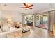 Spacious living area with access to the kitchen and patio at 6706 22Nd W Ave, Bradenton, FL 34209