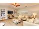 Comfortable living room with ample seating and wood-look floors at 6706 22Nd W Ave, Bradenton, FL 34209