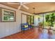 Relaxing screened porch with tiled floor and outdoor access at 6706 22Nd W Ave, Bradenton, FL 34209