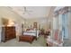 Spacious bedroom with a comfortable bed and ample natural light at 7121 Victoria Cir, University Park, FL 34201