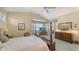 Serene bedroom with a dresser, comfortable bed and relaxing view at 7121 Victoria Cir, University Park, FL 34201