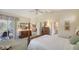 Bright bedroom featuring a charming view and convenient access to other rooms at 7121 Victoria Cir, University Park, FL 34201