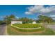 University Park community entrance with landscaped gardens at 7121 Victoria Cir, University Park, FL 34201