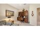 Home office with built-in wooden desk and shelving at 7121 Victoria Cir, University Park, FL 34201