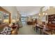Spacious living room with high ceilings and floral furniture at 7121 Victoria Cir, University Park, FL 34201