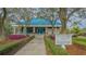 Tennis and fitness center with landscaping at 7121 Victoria Cir, University Park, FL 34201