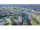 Aerial view of condo community near golf course and lake at 7130 Fairway Bend Ln # 193, Sarasota, FL 34243
