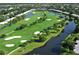 Aerial view of golf course and community at 7130 Fairway Bend Ln # 193, Sarasota, FL 34243