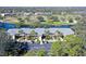 Aerial shot showcasing a condo building with ample parking and scenic surroundings at 7130 Fairway Bend Ln # 193, Sarasota, FL 34243