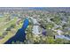 Aerial view of condo building near golf course and water at 7130 Fairway Bend Ln # 193, Sarasota, FL 34243