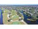 Aerial view of condo community by the golf course and lake at 7130 Fairway Bend Ln # 193, Sarasota, FL 34243