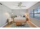 Cozy bedroom with a daybed, a ceiling fan, and plenty of natural light at 7130 Fairway Bend Ln # 193, Sarasota, FL 34243