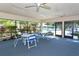 Bright and airy community room with seating and large windows at 7130 Fairway Bend Ln # 193, Sarasota, FL 34243