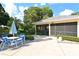 Community patio with table and chairs, perfect for gatherings at 7130 Fairway Bend Ln # 193, Sarasota, FL 34243