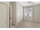 Bright bedroom featuring wood-look floors and ample closet space at 7160 Rue De Palisades # 4, Sarasota, FL 34238