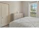Serene bedroom with large window and ample closet space at 7160 Rue De Palisades # 4, Sarasota, FL 34238