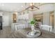 Rustic dining table with seating for four, located in the kitchen at 7160 Rue De Palisades # 4, Sarasota, FL 34238