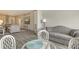 Dining area with glass table and comfortable seating at 7160 Rue De Palisades # 4, Sarasota, FL 34238
